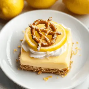 Brighten up your dessert table with this refreshing Lemon Pretzel Dessert! Combining a crunchy pretzel crust with a creamy lemon filling, this treat is perfect for warm days. It's a delightful mix of sweet and salty that everyone will love. Save this recipe for your next gathering or family meal; it's sure to impress!
