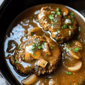 Comfort food at its best! This Slow Cooker Salisbury Steaks recipe features juicy beef patties smothered in a rich mushroom gravy. Perfect for busy weeknights or Sunday dinner, this meal is both hearty and satisfying. Don’t forget to save this recipe for when you want an easy, delicious dinner that the whole family will love!