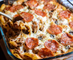 Delicious easy weeknight pizza casserole with melted cheese and toppings, perfect for a quick family dinner.